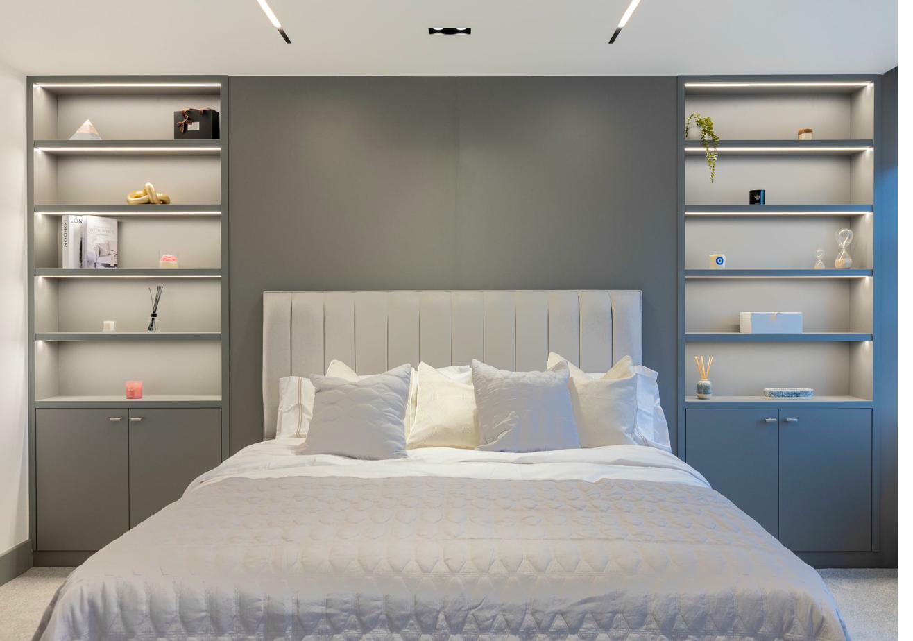 Spacious master bedroom with natural light and modern design