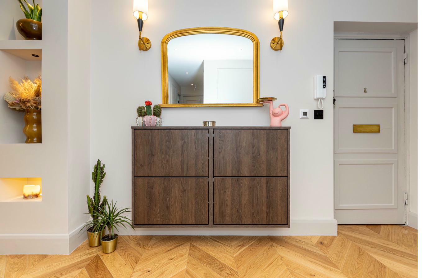 Elegant entrance hallway with illuminated display cabinet