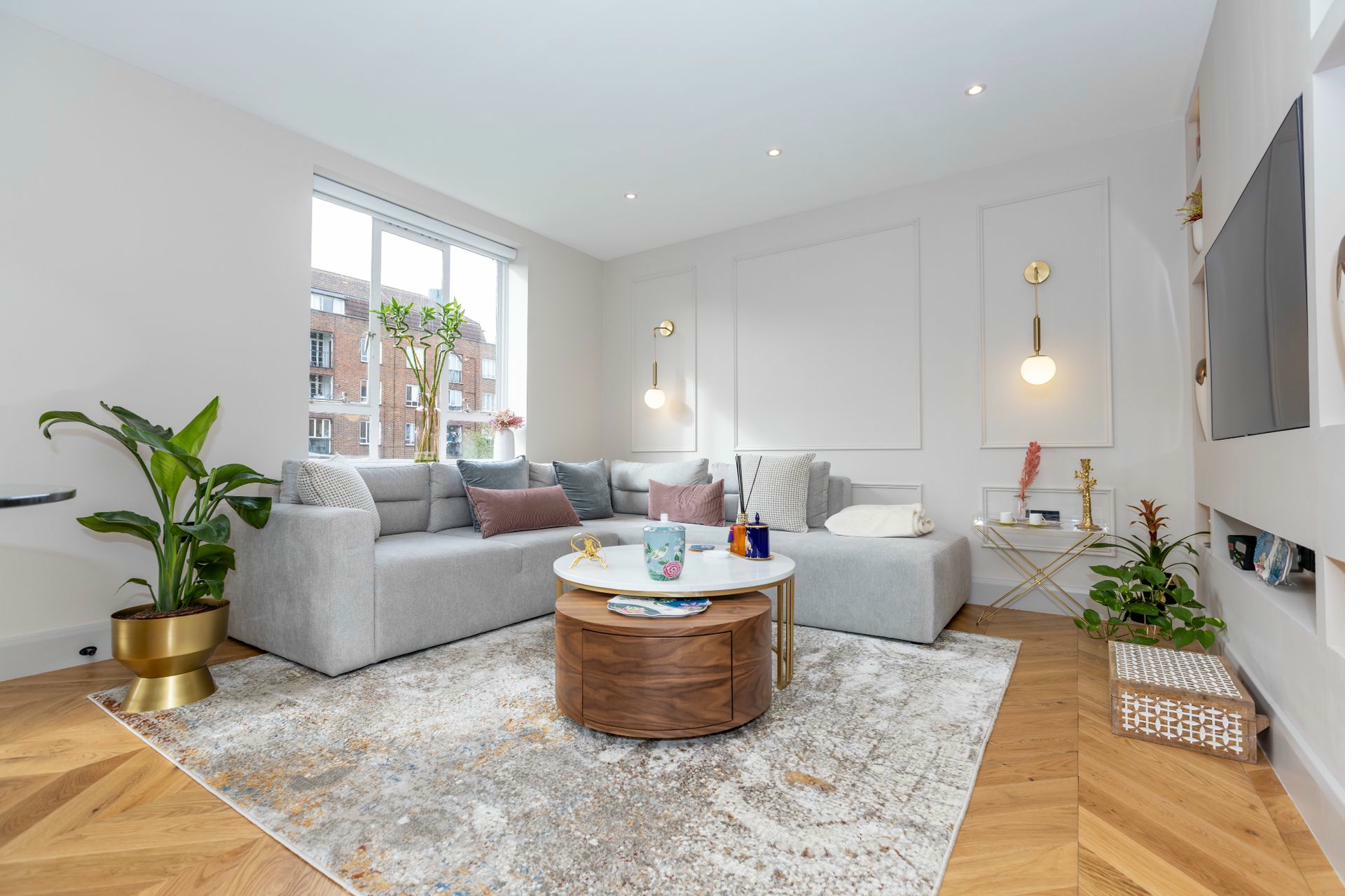 Bright living space with floor to ceiling windows